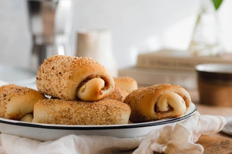 Senoriate Bread on a platter set on a breakfast table