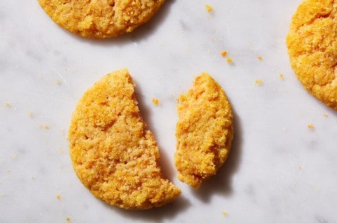 Olive Oil-Orange Sugar Cookies broken in half to a crispy texture