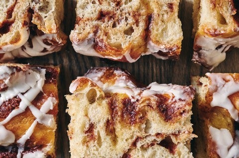Cinnamon Roll Focaccia laid out on a cutting board