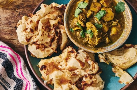 Buss Up Shut (Paratha Roti) on a plate