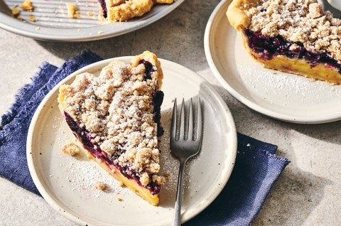 A slice of Lemon-Blueberry Streusel Pie on a plate
