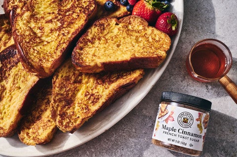 French Toast on a plate with a jar of Maple Cinnamon from King Arthur Baking