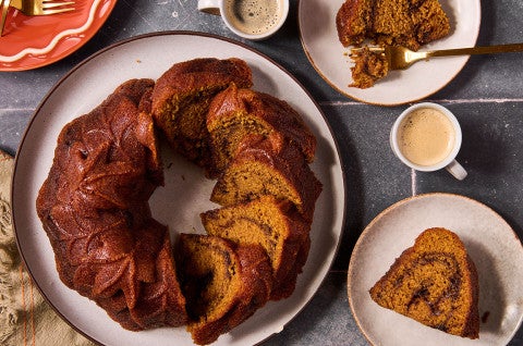 Pumpkin Espresso Bundt Cake shown in the shape of the bundt can but sliced
