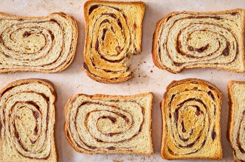 Sourdough Cinnamon Swirl Bread arranged on a counter seen from above