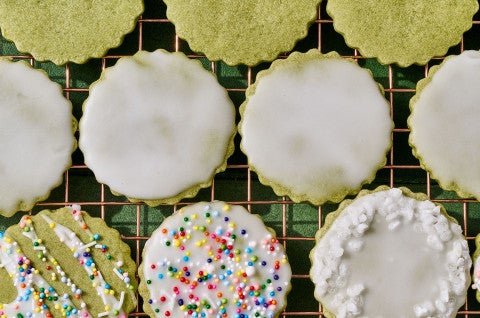 Glazed Matcha Cookies arranged on a cooling rack, seen from above