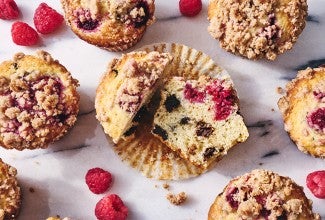 A cut-in-half Raspberry-Chocolate Chip Muffin