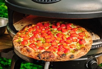 Pizza being baked in a Gozney pizza oven 