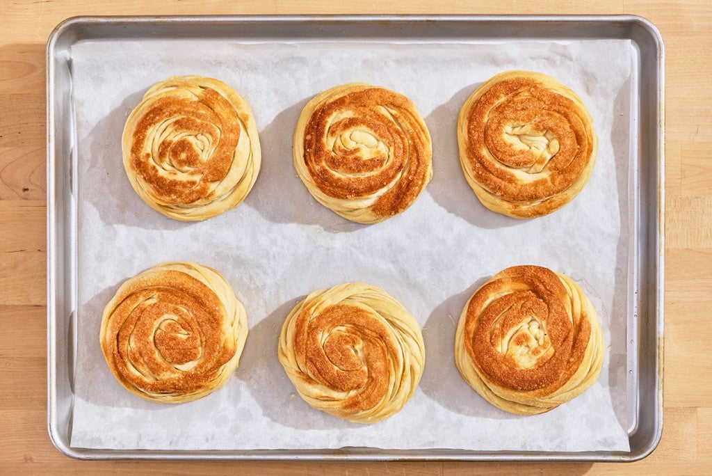 Thousand Layer Mo's on a baking sheet seen from above.