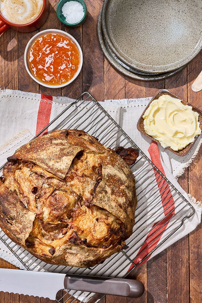 Sourdough Apple Cinnamon Hearth Bread on a cooling rack seen from above