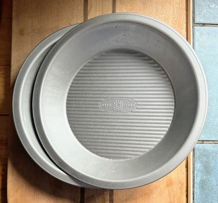 Two King Arthur 9" pie pans, one partially nested atop the other.
