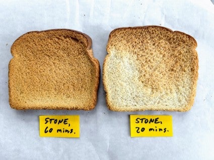 Two slices of toast side by side, one more evenly browned than the other.