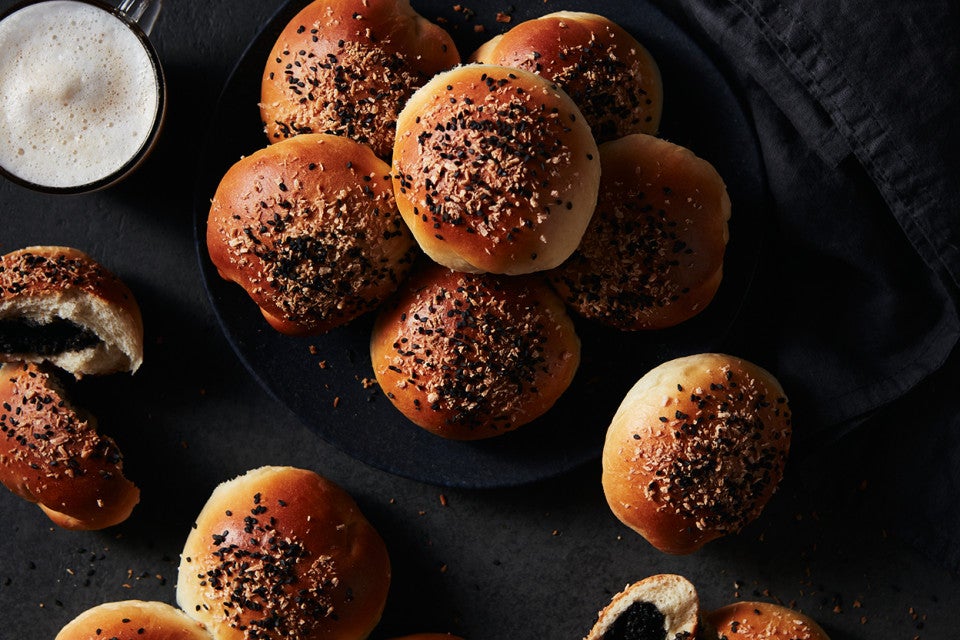 Black Sesame and Coconut Buns in a pile