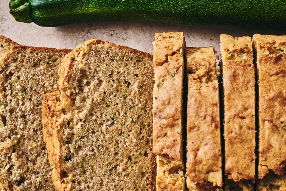 Almond Flour Zucchini Bread next to a zucchini