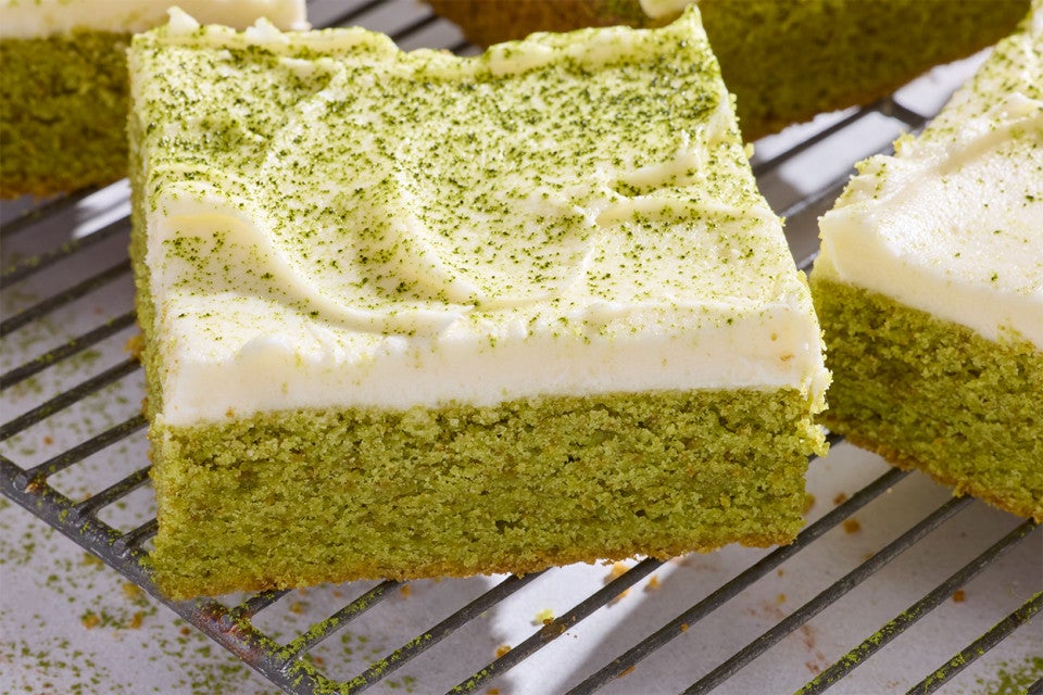 Matcha Latte Bars sliced on a cooling rack