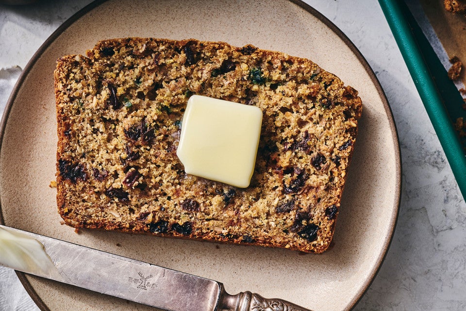 Rye Soda Bread on a plate with a pat of butter