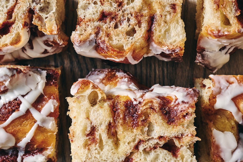 Cinnamon Roll Focaccia laid out on a cutting board