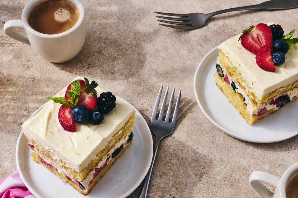 Two slices of Berry Tiramisu on plates