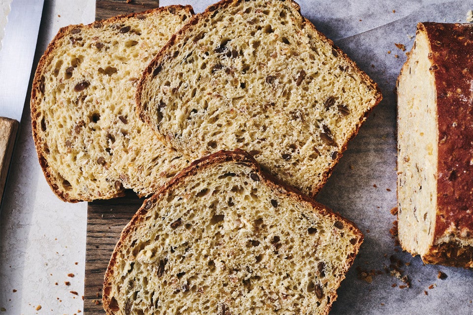 Kansas Sunflower Bread sliced on a cutting board