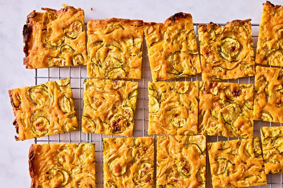 Scarpaccia (Italian Zucchini Tart) cut up on a cooling rack