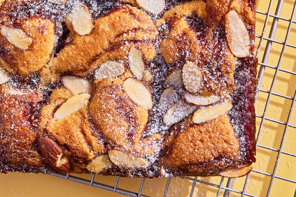 Raspberry Frangipane Bars on a cooling rack unsliced