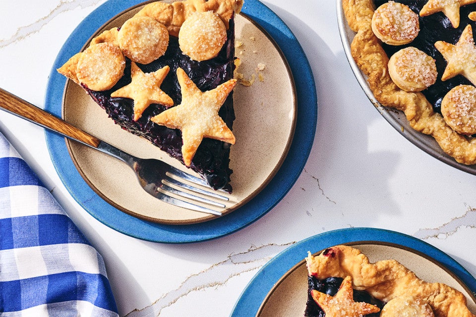 Fresh Blueberry Pie sliced up and served on plates