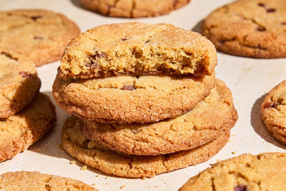 A stack of Peanut Butter and Jelly Cookies on a counter