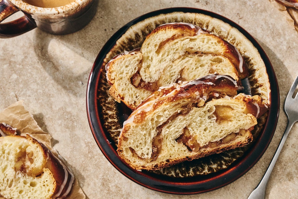 Slices of Cinnamon Apple Twist Bread on a plate