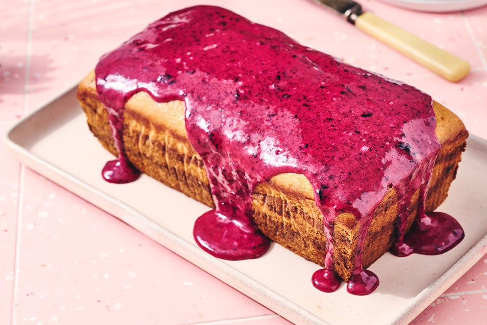 Lemon Blueberry Loaf Cake covered in a berry drizzle