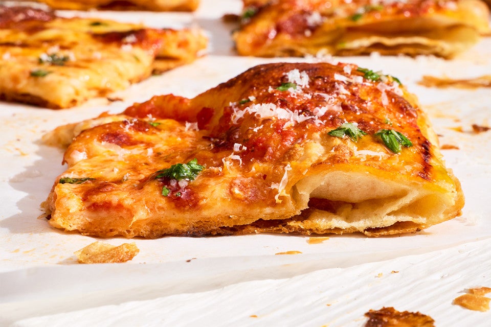 A slice of Flaky Puff Crust Pizza