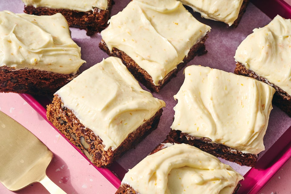 Tomato Soup Spice Cake sliced and shown on a baking sheet.