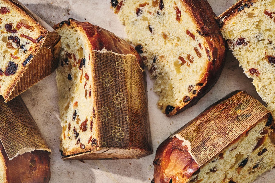 Overnight Panettone sliced and arranged on a counter seen from above.