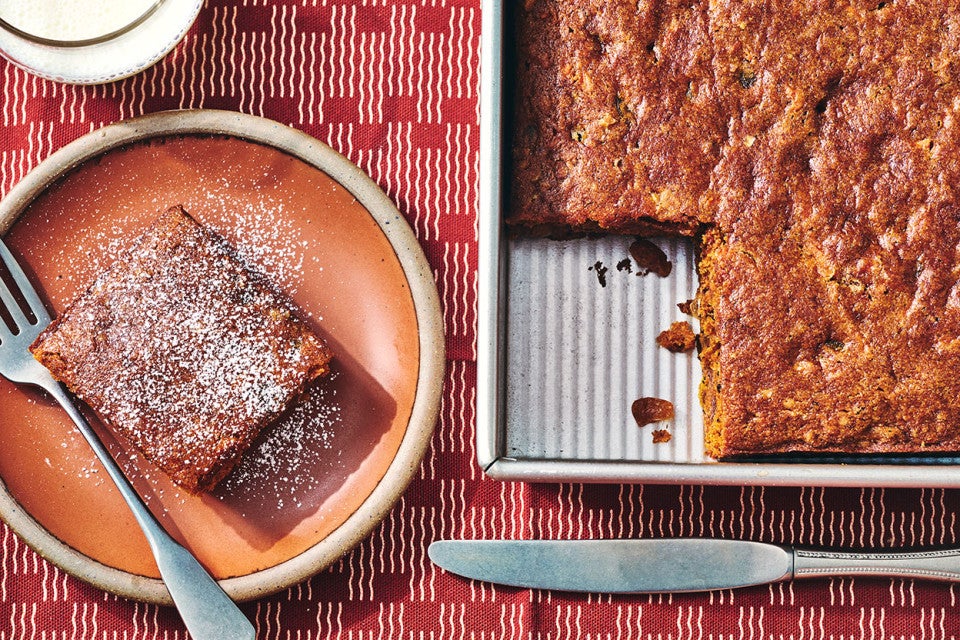 Spicy Cake Pan Cake in a King Arthur Baking square baking pan and a slice on a plate.