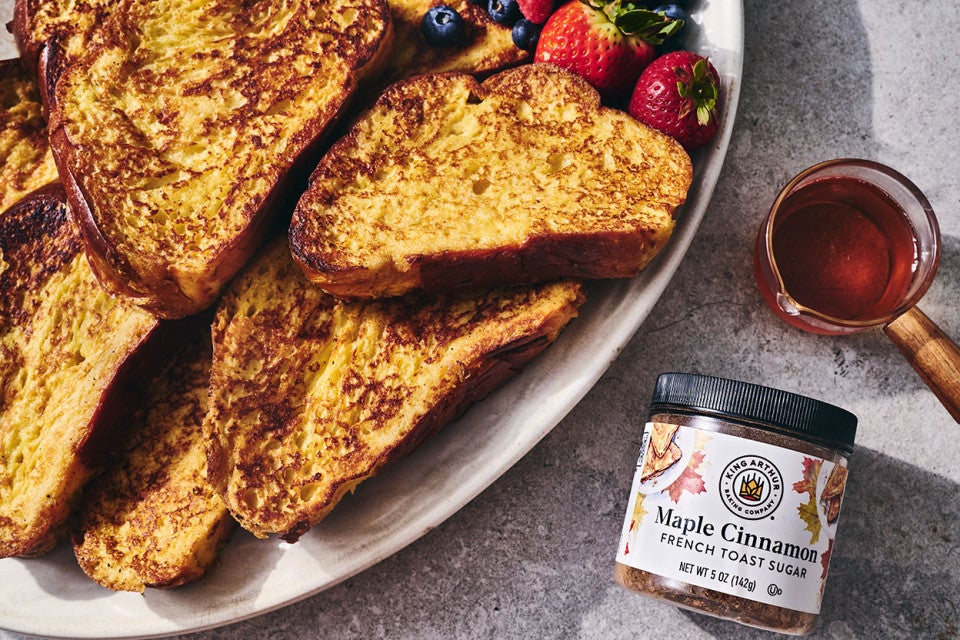 French Toast on a plate with a jar of Maple Cinnamon from King Arthur Baking