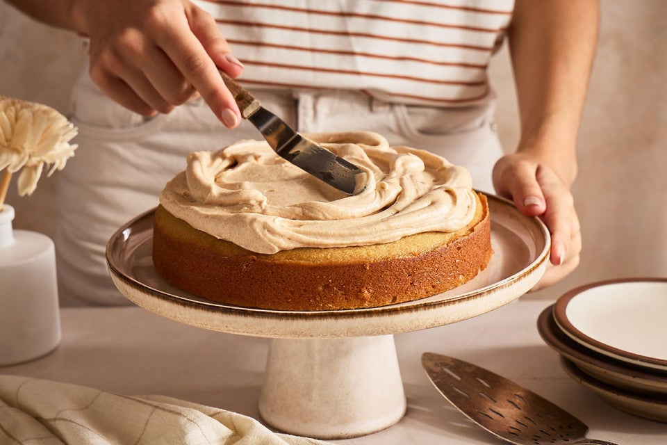 Spreading frosting on Frosted Brown Butter Cake