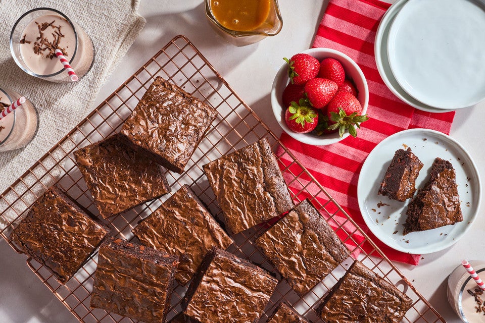 Fudge Brownies on a cooling rack seen from above.