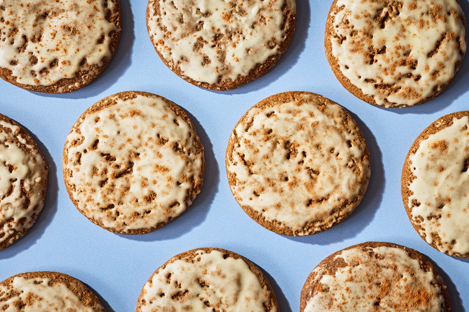 Gingerbread Latte Cookies arranged on a blue surface