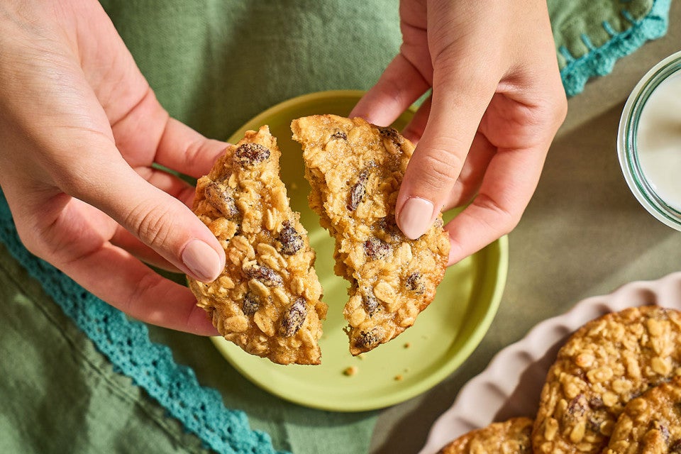 Breaking a soft oatmeal raisin cookie