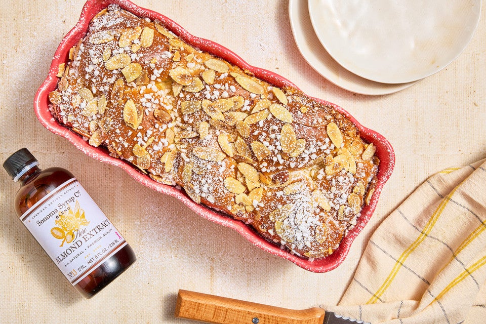 Almond Croissant Milk Bread in a pink loaf pan