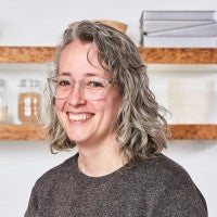 A headshot of Maggie Perry