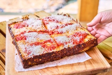 Pizza Oven Detroit Pizza on a cutting board
