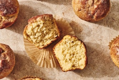 A Cinnamon-Sugar Doughnut Muffins cut in half