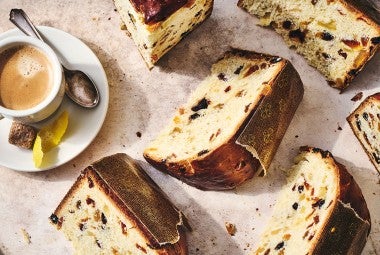 Overnight Panettone sliced and arranged on a counter seen from above.