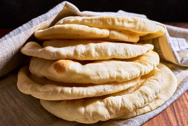 A stack of Golden Pita Bread on a counter