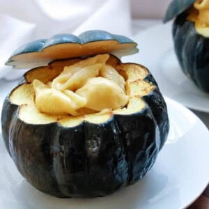 Mac and Cheese Stuffed Acorn Squash on a white plate