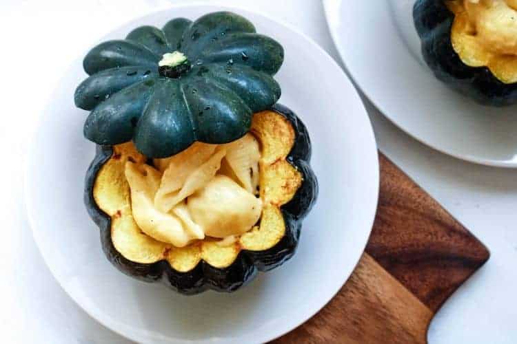 Mac and Cheese Acorn Squash from over top on a white plate