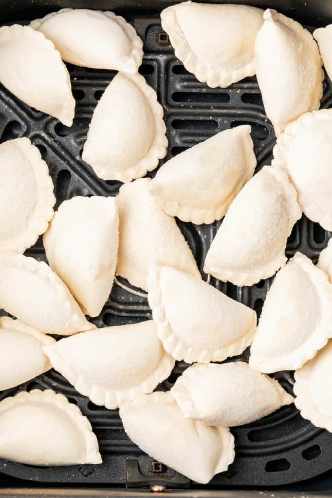frozen pierogies in an air fryer basket