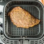 Cooked steak inside air fryer