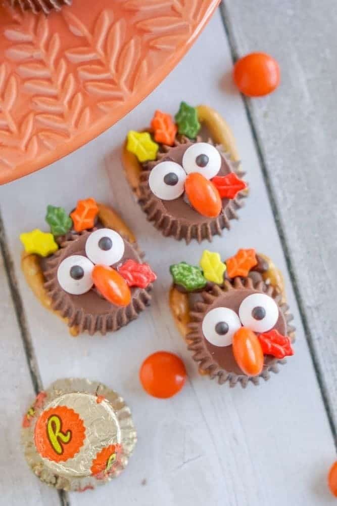 3 Reese's cup turkeys with a wrapped mini Reese's cup next to them