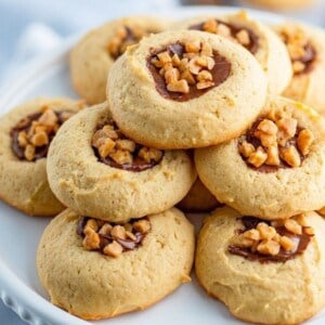 Toffee Cookies stacked on a white cakestand