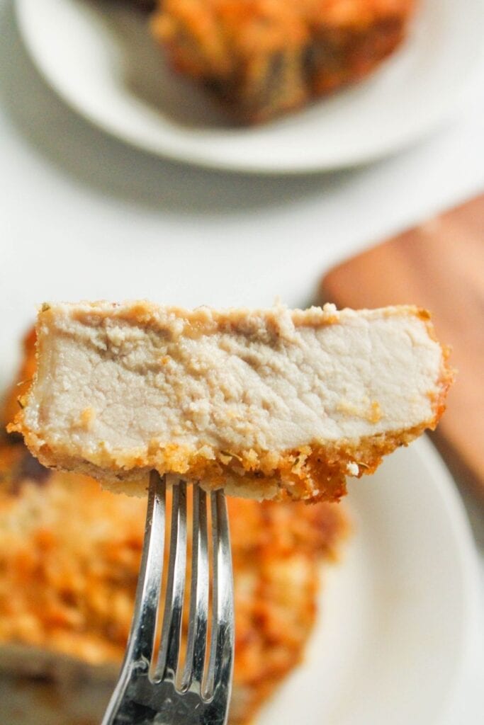 Piece of Air Fryer Breaded Pork Chop on a fork
